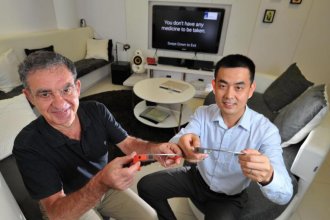 Photo of Prof. Poggio (MIT) and and Dr Xu Qianli (A*Star) PHOTO: LIM YAOHUI FOR THE STRAITS TIMES
