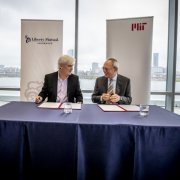 MIT and Liberty Mutual Insurance announced a $25 million, five-year collaboration to support intelligence research at a meeting on Tuesday attended by Liberty Mutual Chairman and CEO David Long (left) and MIT President L. Rafael Reif.  Photo: Rose Lincoln