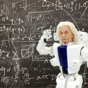 Einstein robot at chalkboard with equations